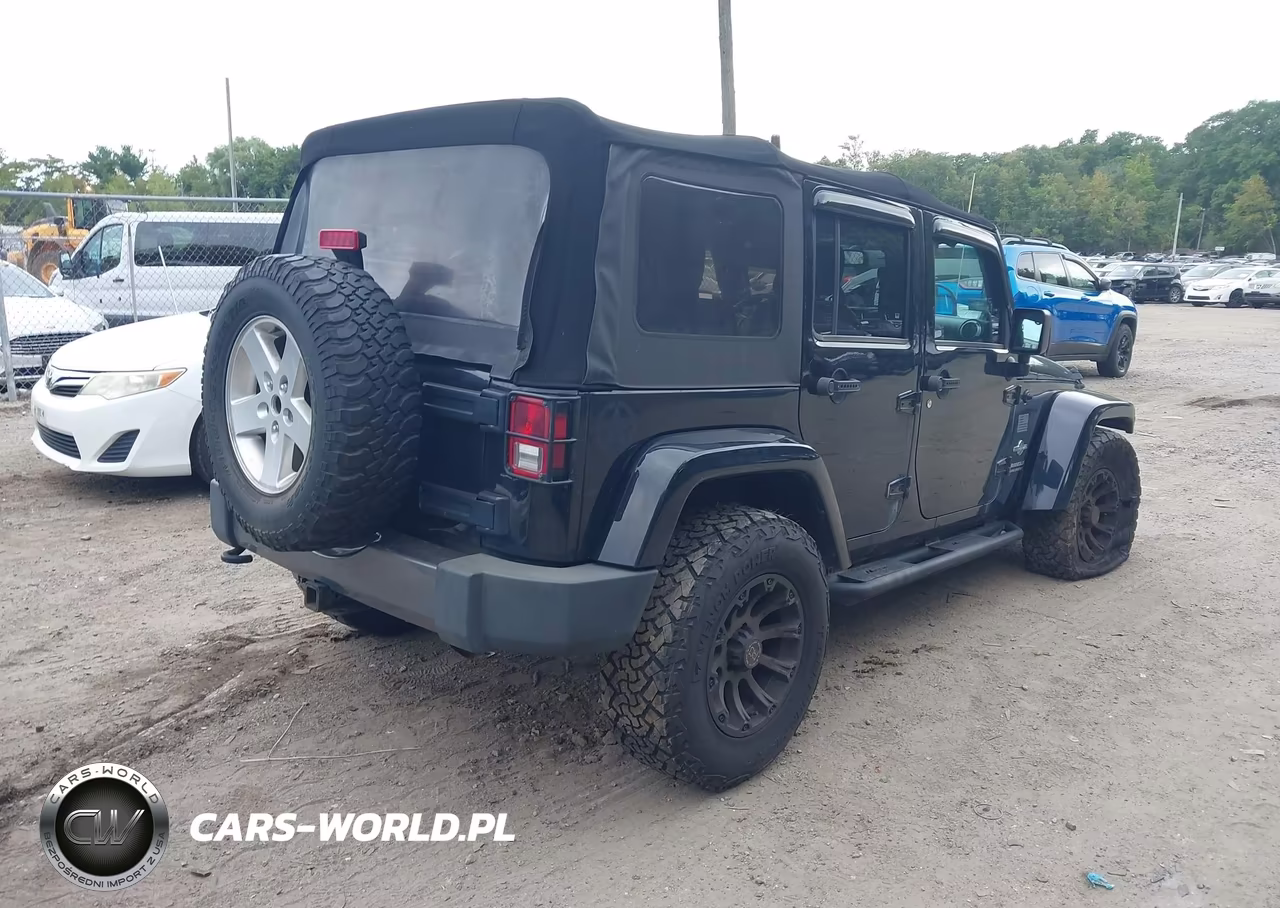 2014 Jeep Wrangler Unlimited Freedom Edition VIN:1C4BJWDG4EL184297 - 4