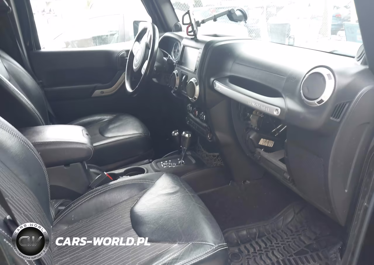 2014 Jeep Wrangler Unlimited Freedom Edition VIN:1C4BJWDG4EL184297 - 5