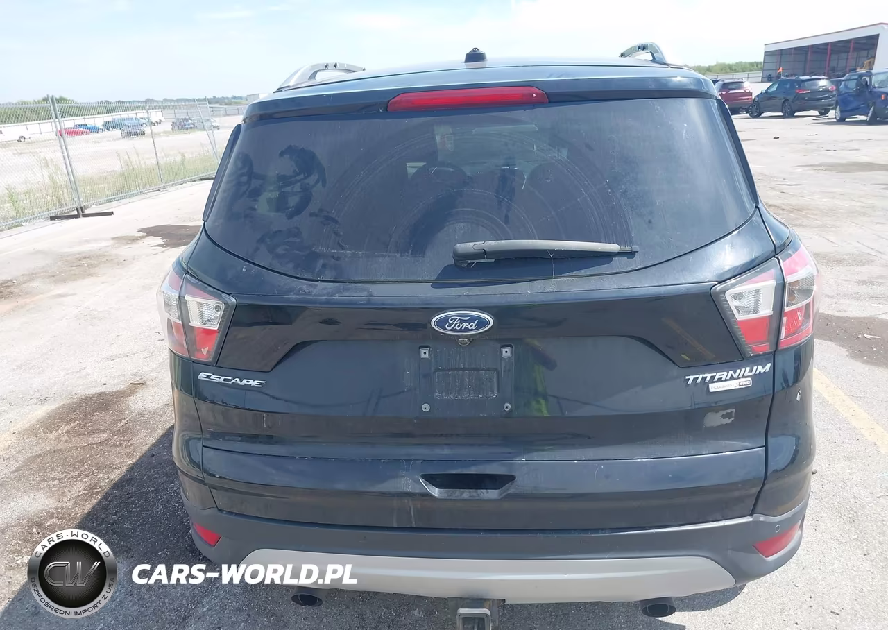 2017 Ford Escape Titanium VIN:1FMCU9J96HUA50128 - 16
