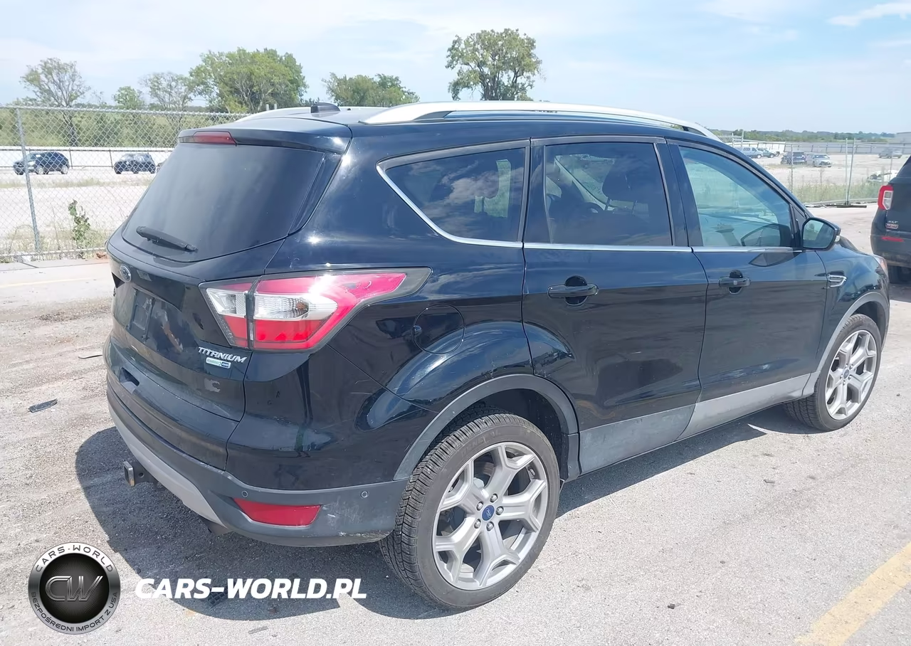 2017 Ford Escape Titanium VIN:1FMCU9J96HUA50128 - 4