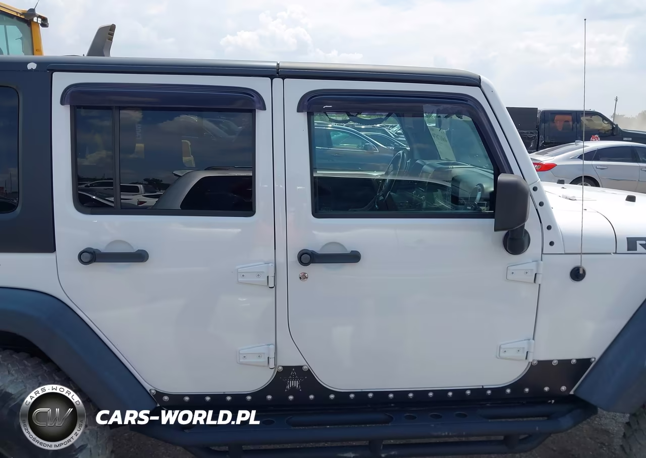 2011 Jeep Wrangler Unlimited Rubicon VIN:1J4BA6H10BL536027 - 13