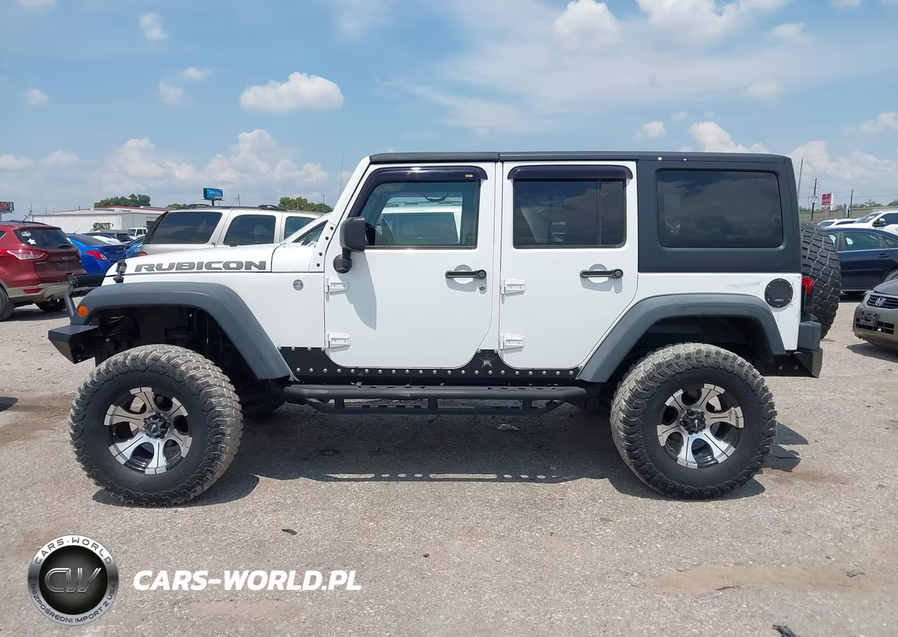 2011 Jeep Wrangler Unlimited Rubicon VIN:1J4BA6H10BL536027 - 14