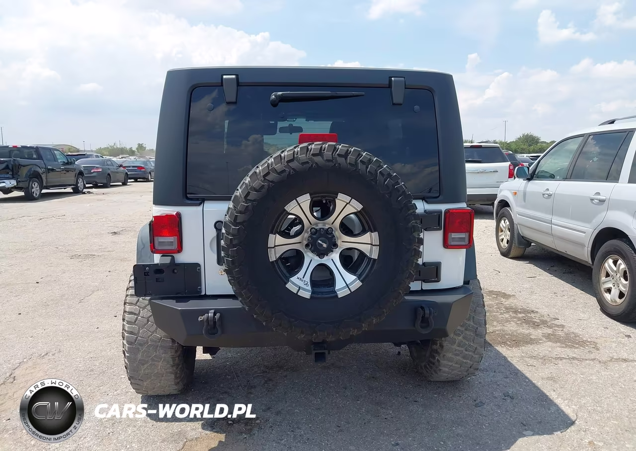 2011 Jeep Wrangler Unlimited Rubicon VIN:1J4BA6H10BL536027 - 16