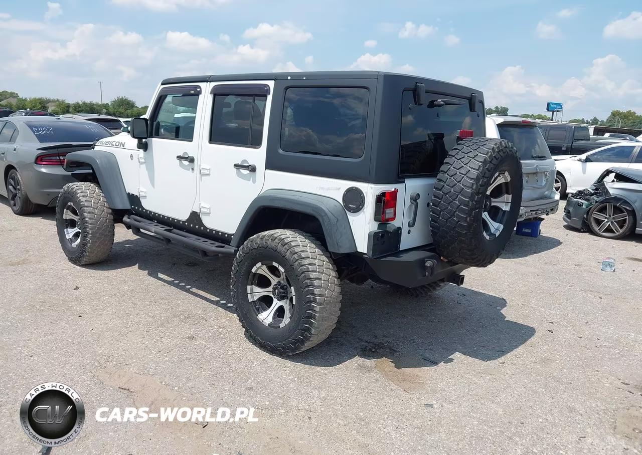 2011 Jeep Wrangler Unlimited Rubicon VIN:1J4BA6H10BL536027 - 3