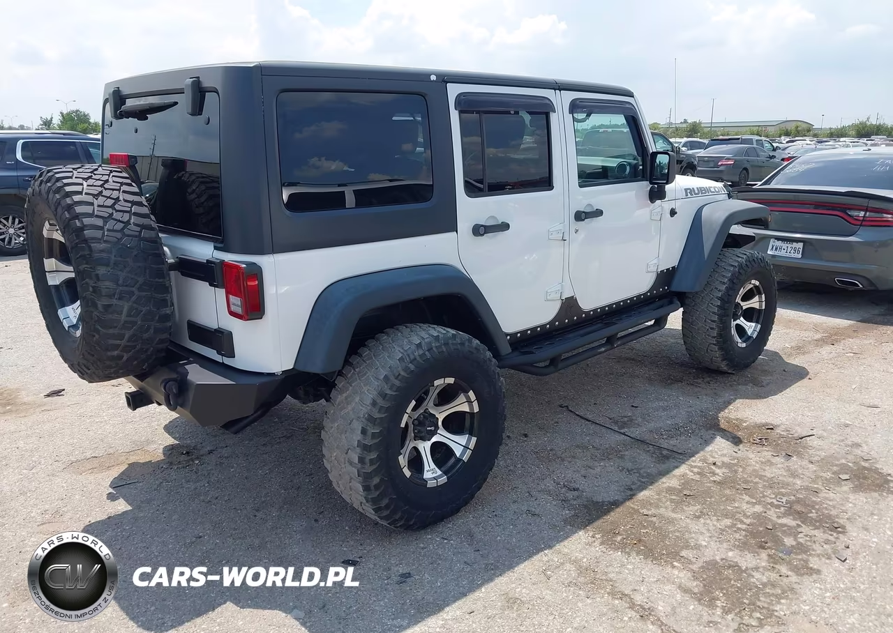 2011 Jeep Wrangler Unlimited Rubicon VIN:1J4BA6H10BL536027 - 4