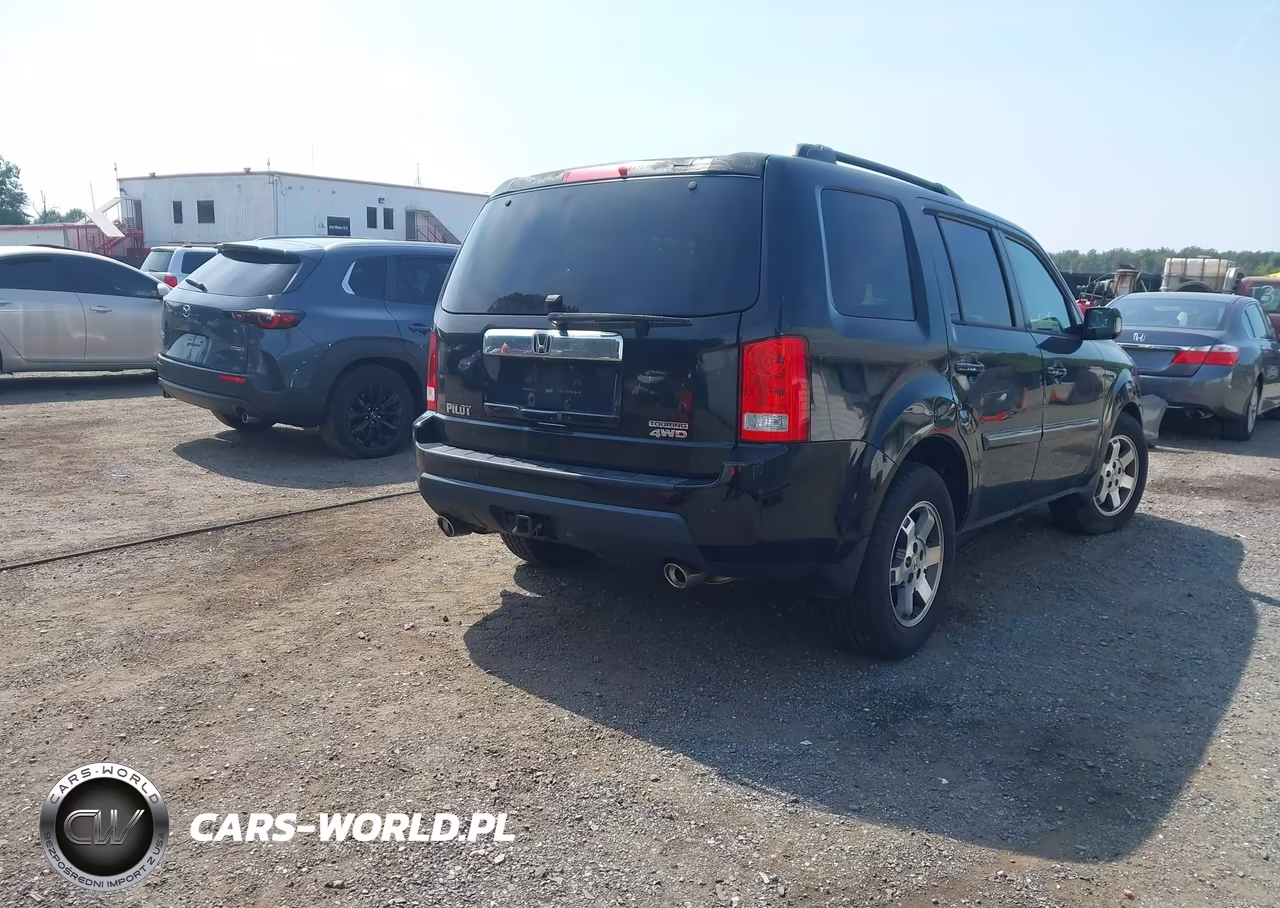 2011 Honda Pilot Touring VIN:5FNYF4H91BB089903 - 4