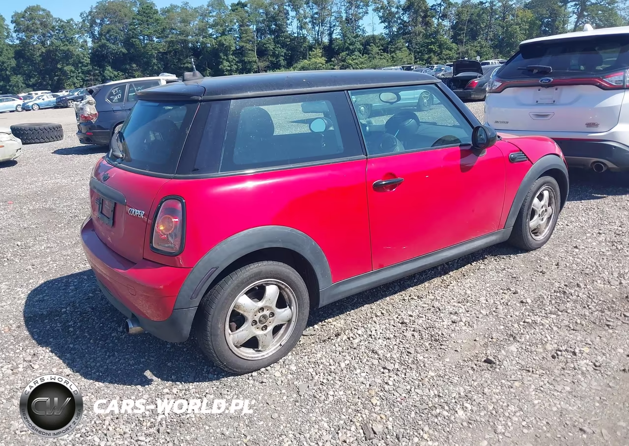 2009 Mini Cooper VIN:WMWMF33519TU75822 - 4