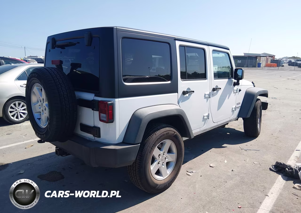 2015 Jeep Wrangler Unlimited Sport VIN:1C4BJWDG1FL609573 - 4
