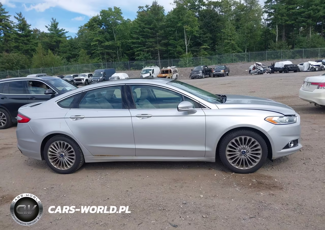 2016 Ford Fusion Titanium VIN:3FA6P0K99GR400303 - 13