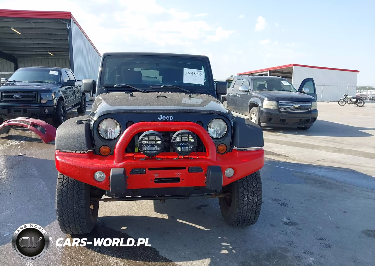 2011 Jeep Wrangler Sport VIN:1J4AA2D15BL508198 - 12