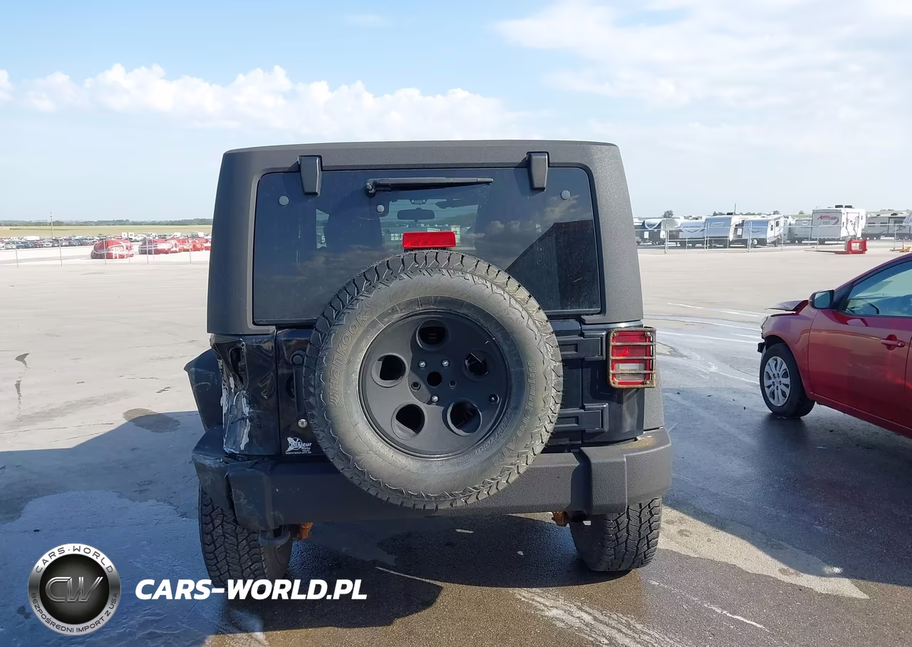 2011 Jeep Wrangler Sport VIN:1J4AA2D15BL508198 - 16