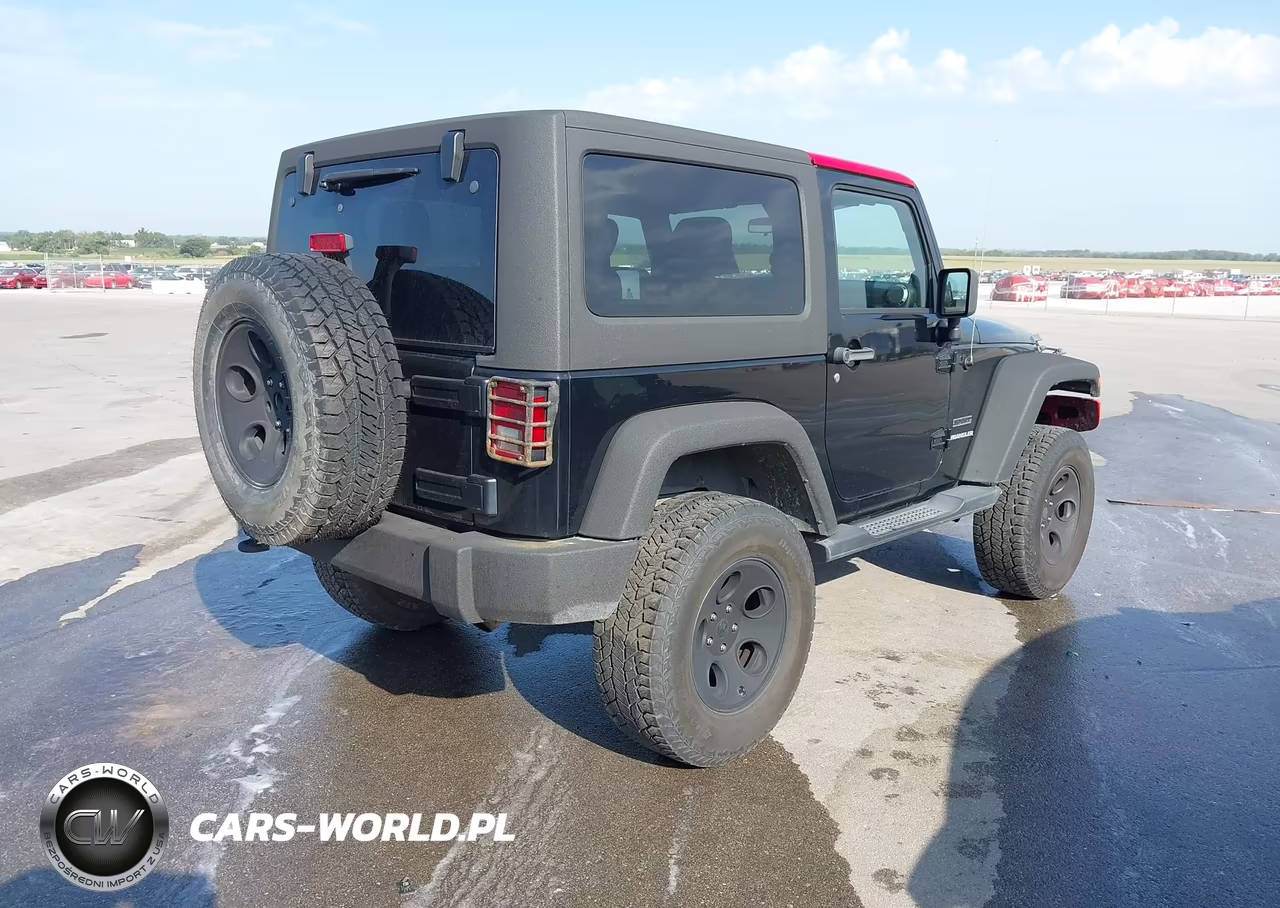2011 Jeep Wrangler Sport VIN:1J4AA2D15BL508198 - 4
