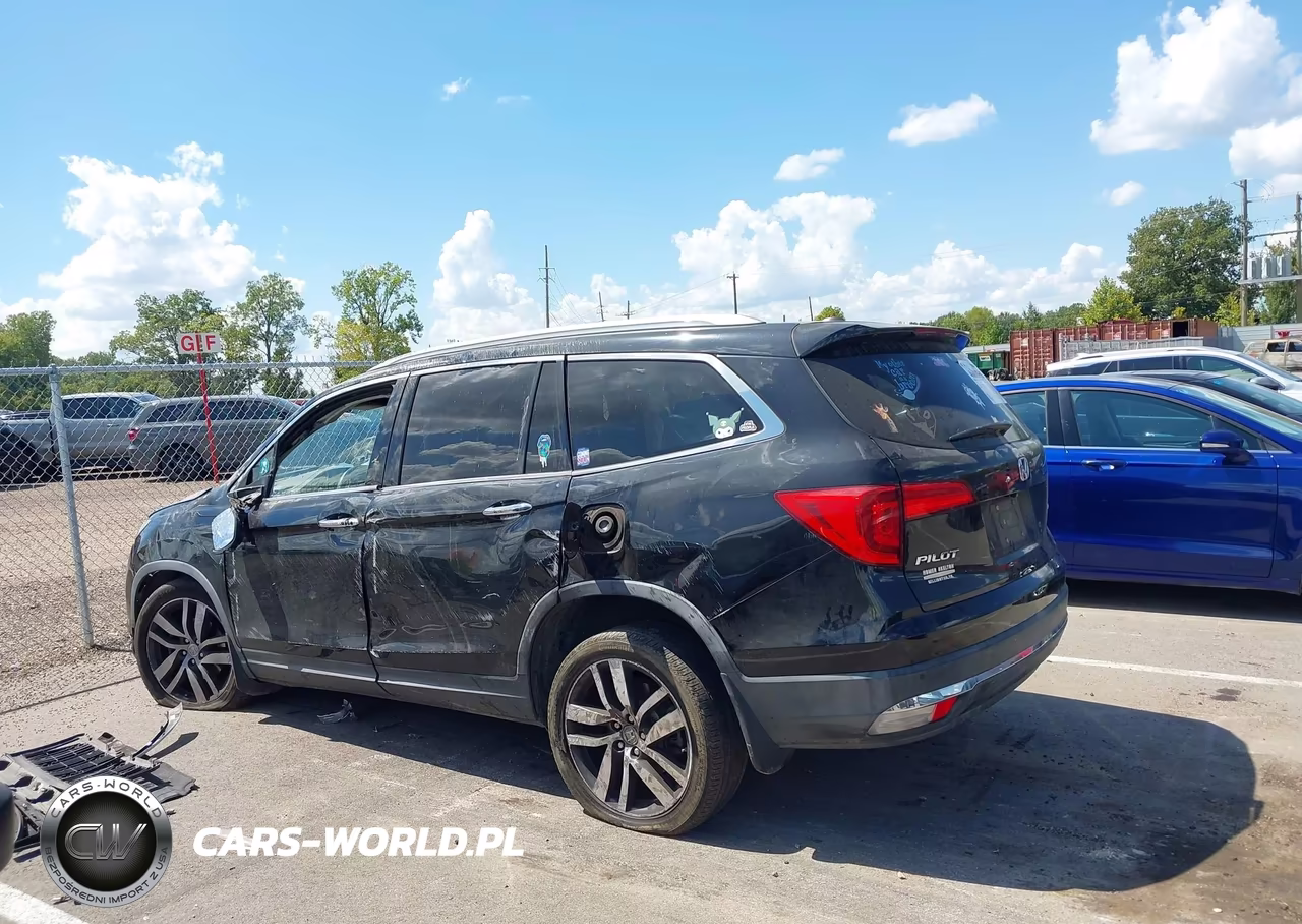 2016 Honda Pilot Touring VIN:5FNYF5H94GB053460 - 14