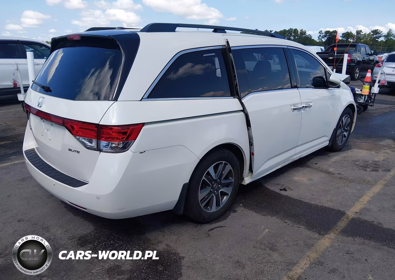 2015 Honda Odyssey Touring-Touring Elite VIN:5FNRL5H94FB057634 - 4