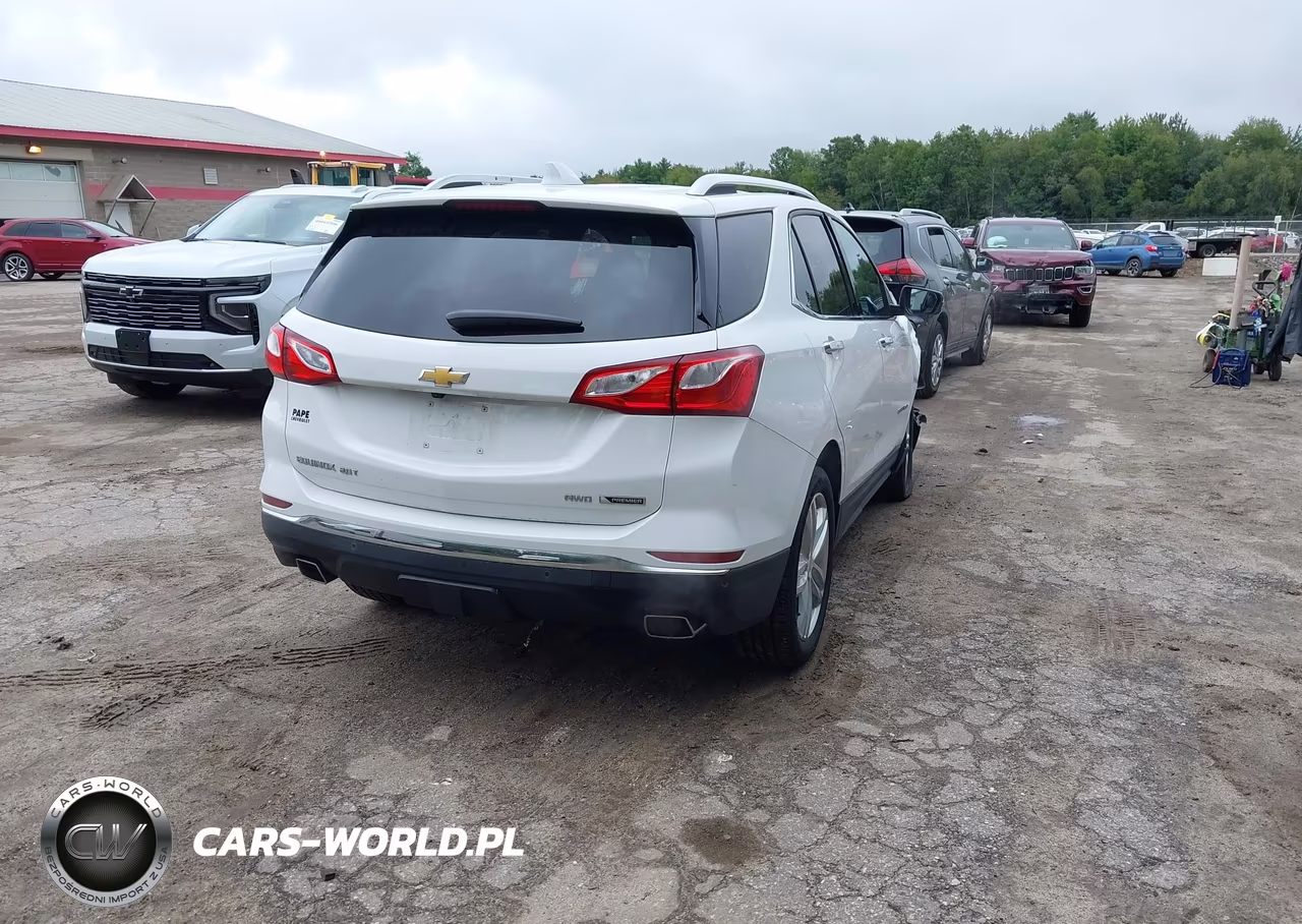 2018 Chevrolet Equinox Premier VIN:2GNAXWEX6J6301784 - 4