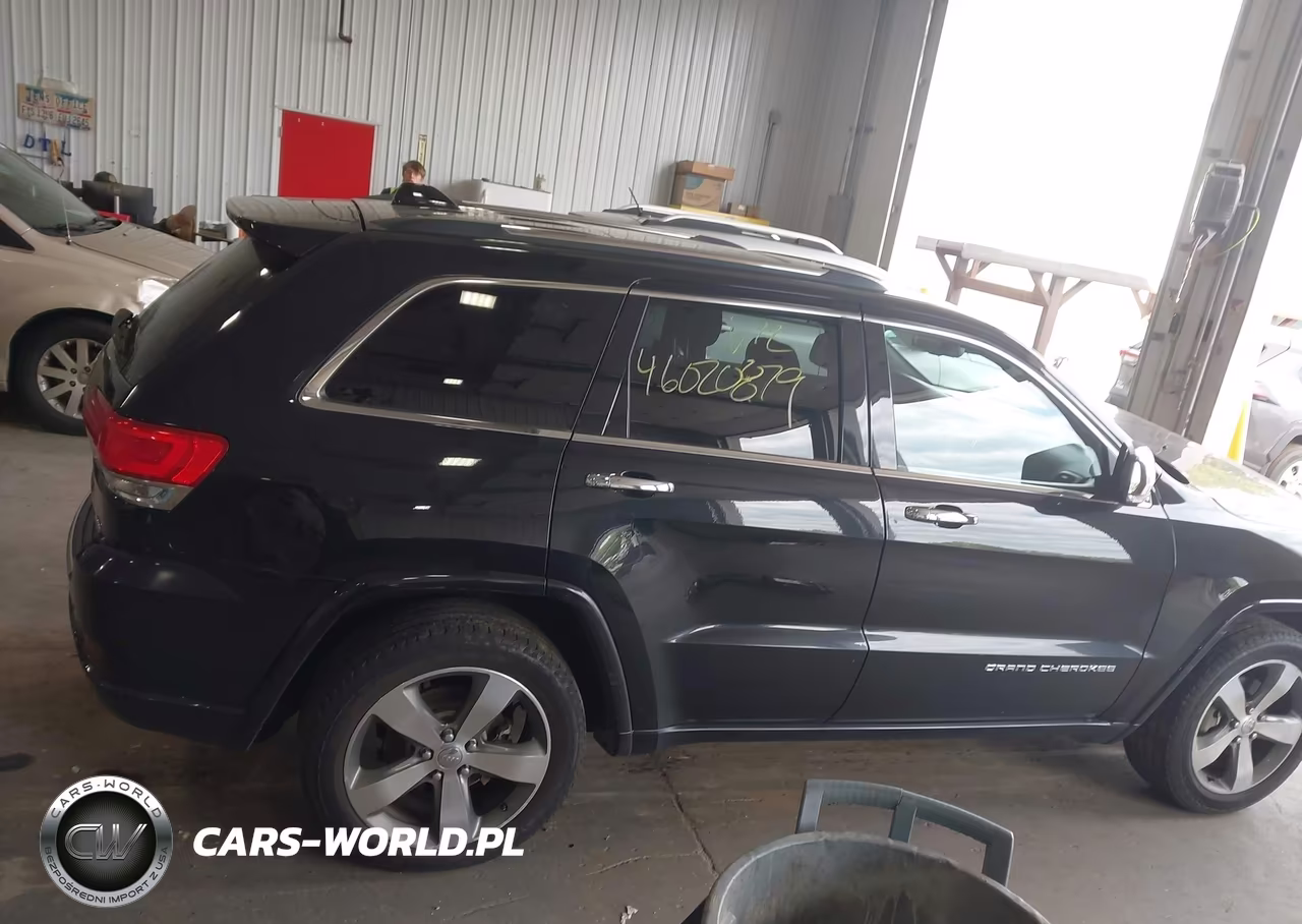 2015 Jeep Grand Cherokee Overland VIN:1C4RJFCG0FC806265 - 13