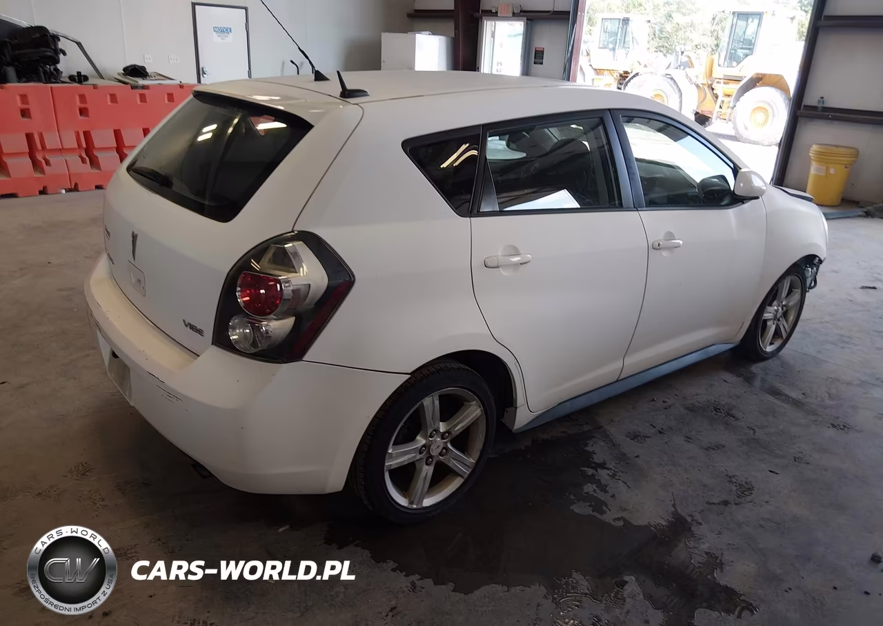 2010 Pontiac Vibe VIN:5Y2SP6E03AZ408828 - 4