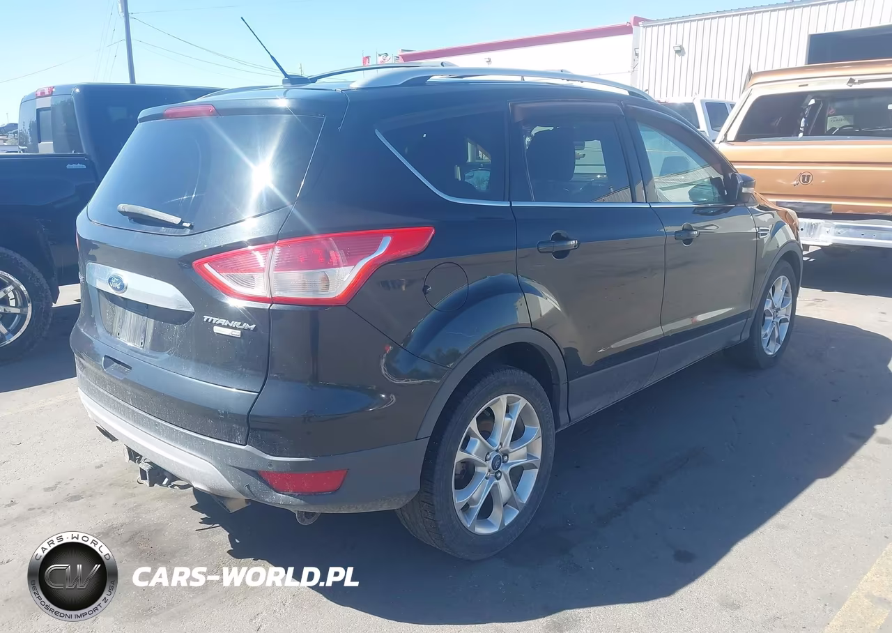 2015 Ford Escape Titanium VIN:1FMCU9JX5FUC10057 - 4