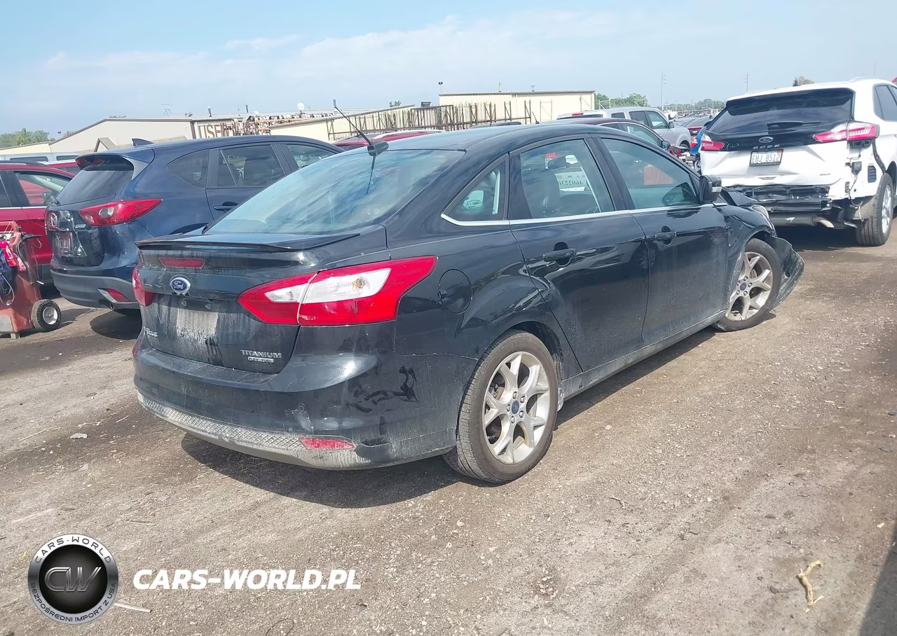 2014 Ford Focus Titanium VIN:1FADP3J26EL412255 - 4