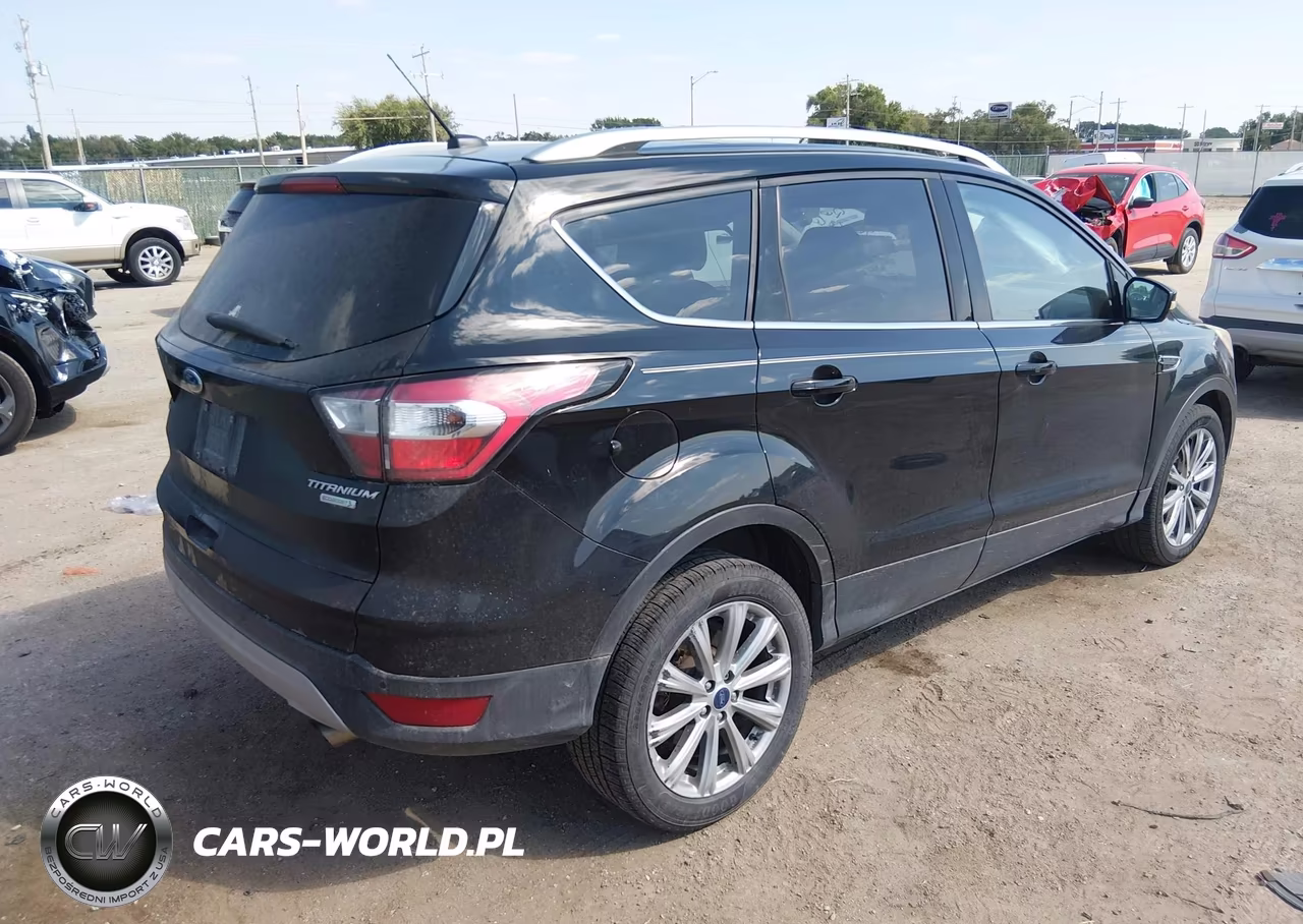 2017 Ford Escape Titanium VIN:1FMCU0JD7HUE72361 - 4