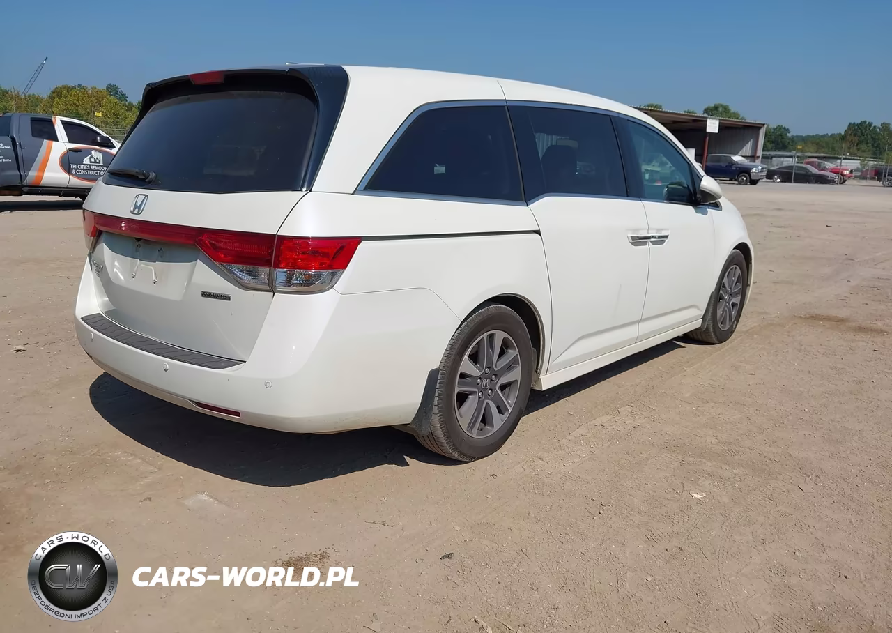 2015 Honda Odyssey Touring-Touring Elite VIN:5FNRL5H91FB040483 - 4