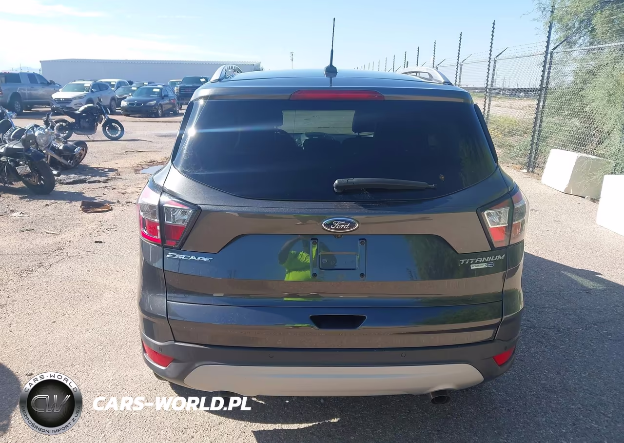 2017 Ford Escape Titanium VIN:1FMCU9JD0HUD20703 - 16