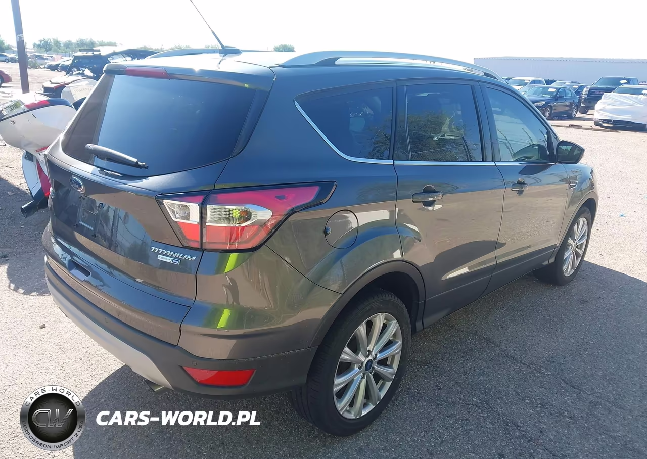 2017 Ford Escape Titanium VIN:1FMCU9JD0HUD20703 - 4