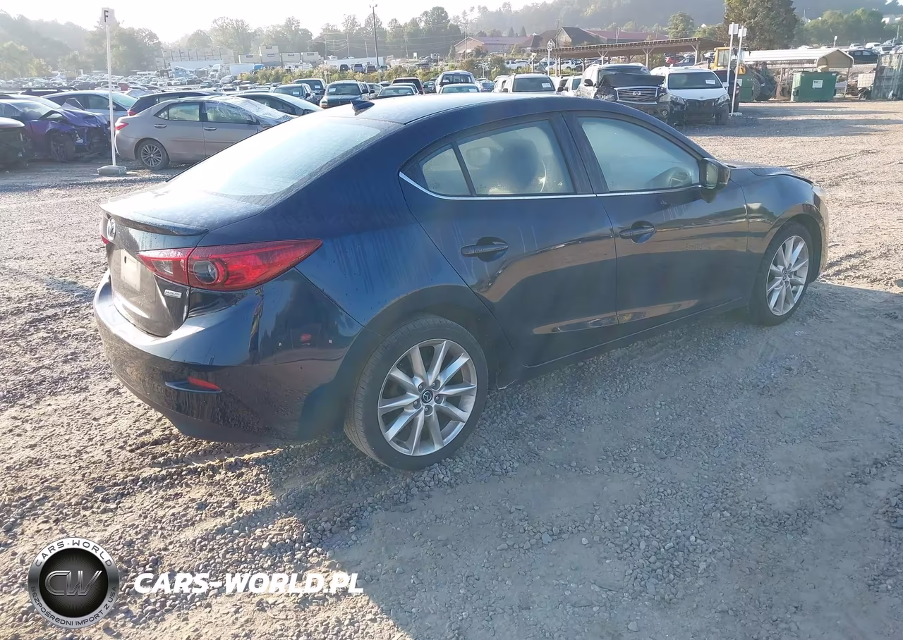 2017 Mazda Mazda3 Touring VIN:JM1BN1V71H1117811 - 4
