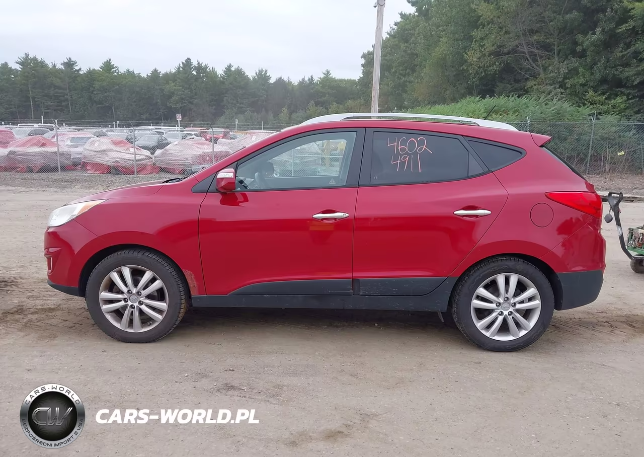 2011 Hyundai Tucson Limited VIN:KM8JUCAC3BU145625 - 12