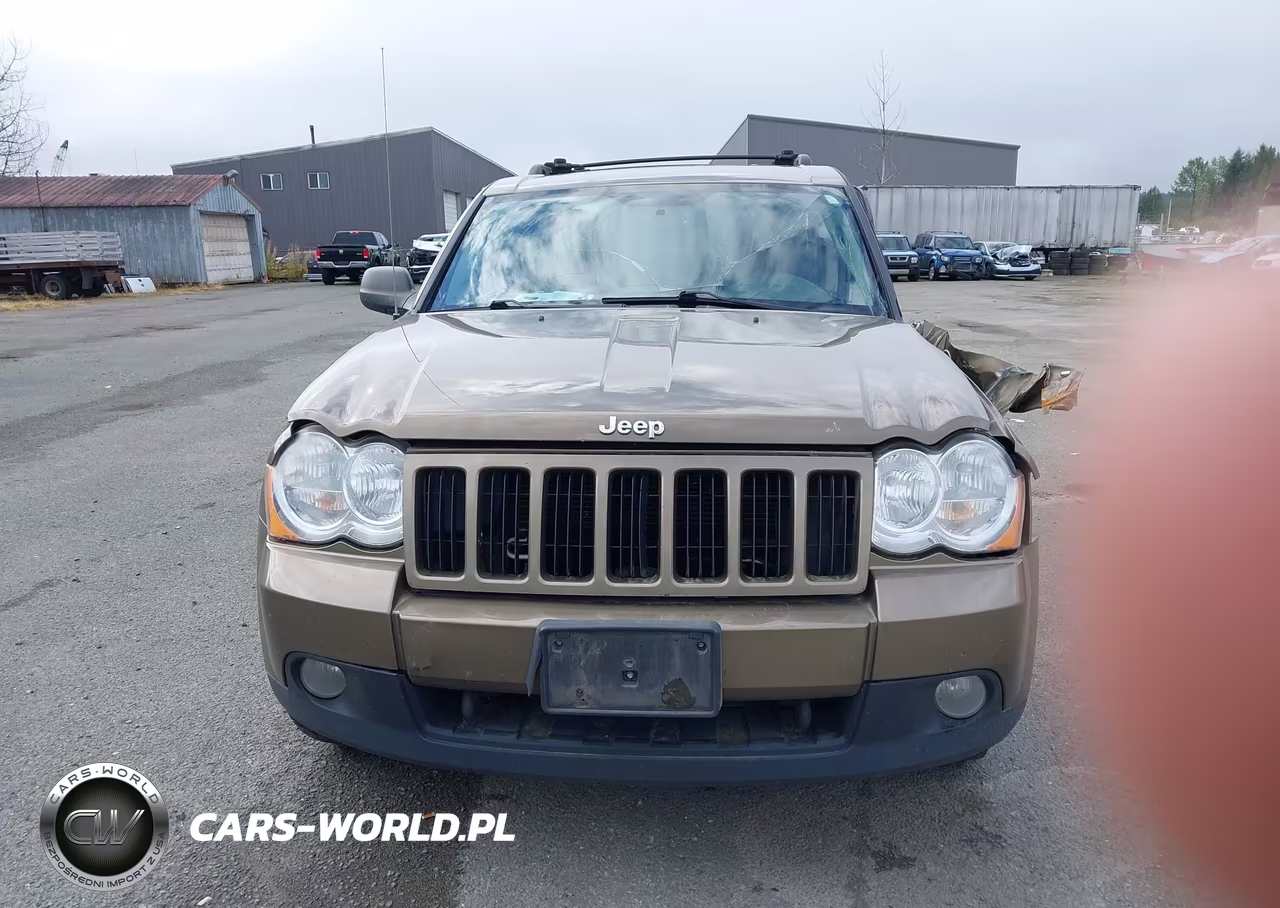 2009 Jeep Grand Cherokee Laredo VIN:1J8HR48P49C542546 - 12