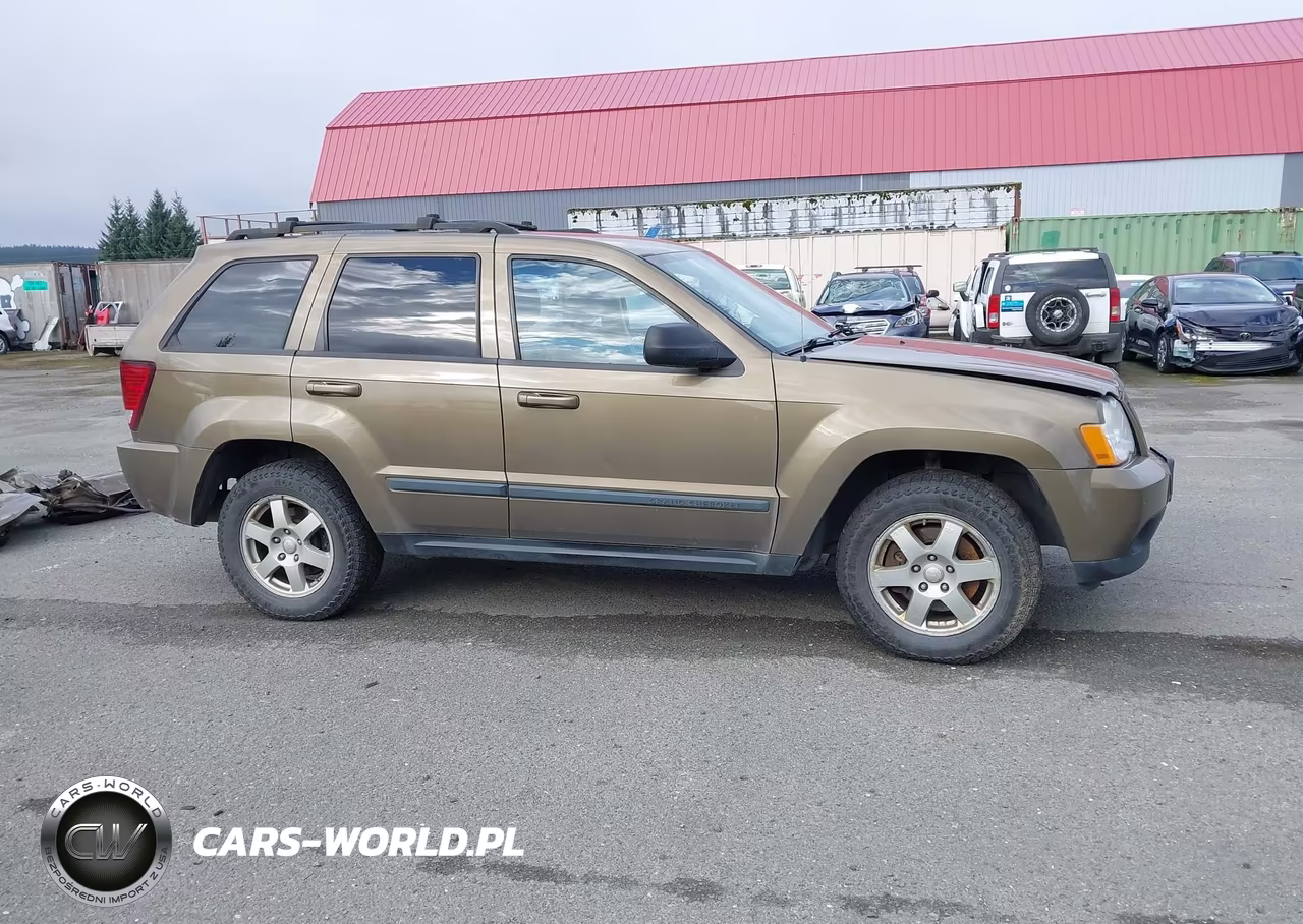2009 Jeep Grand Cherokee Laredo VIN:1J8HR48P49C542546 - 13