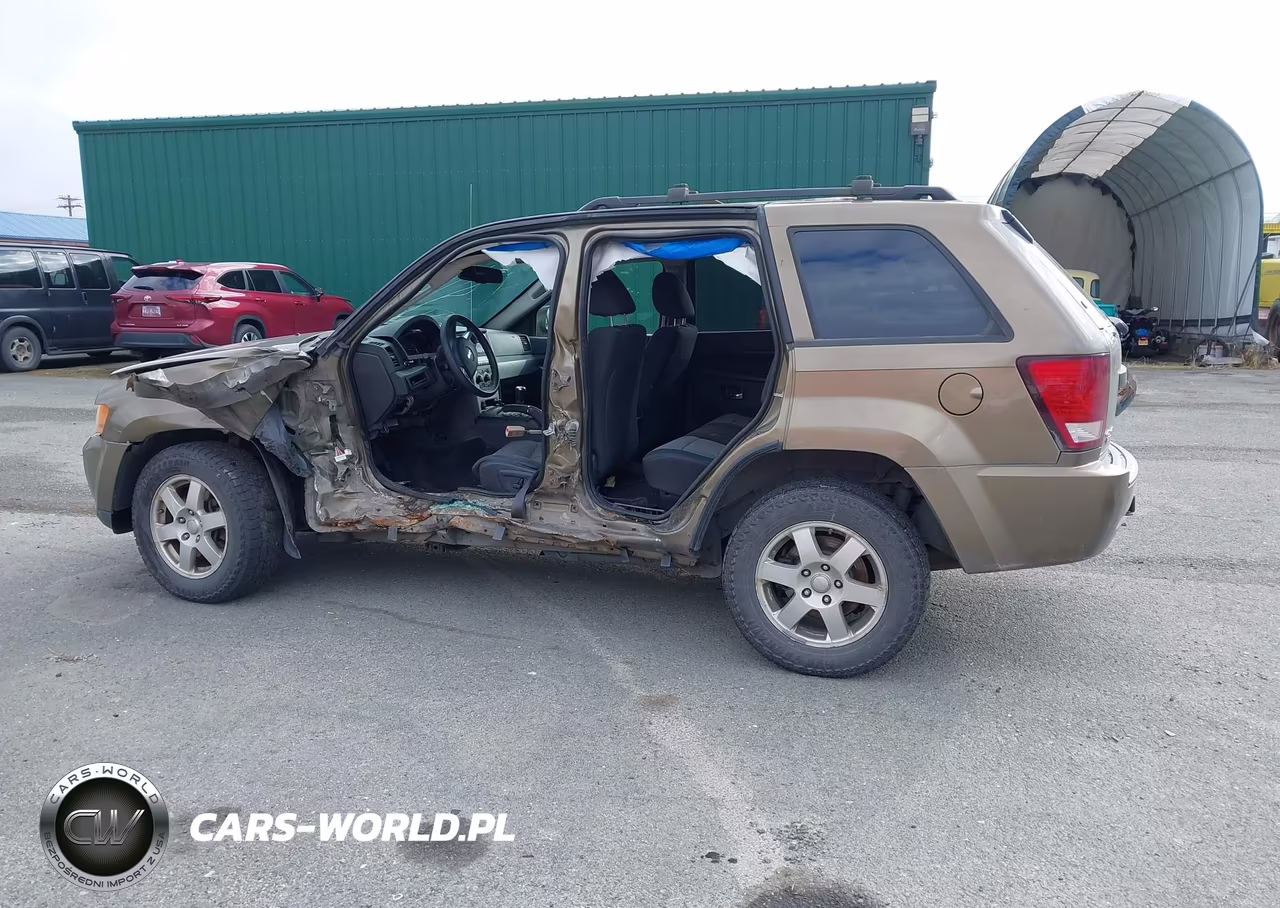 2009 Jeep Grand Cherokee Laredo VIN:1J8HR48P49C542546 - 14