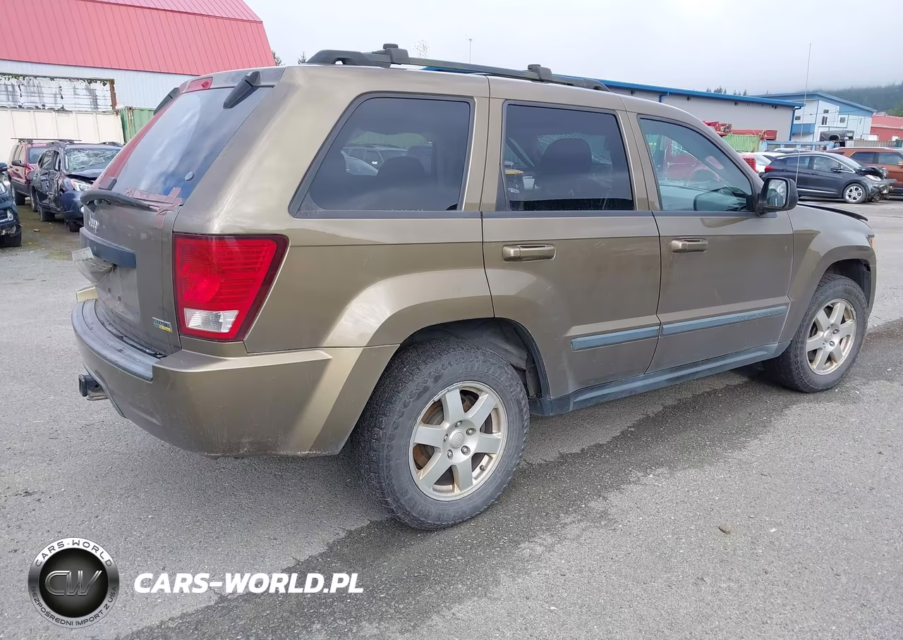 2009 Jeep Grand Cherokee Laredo VIN:1J8HR48P49C542546 - 4
