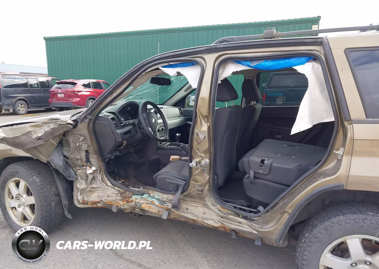 2009 Jeep Grand Cherokee Laredo VIN:1J8HR48P49C542546 - 6