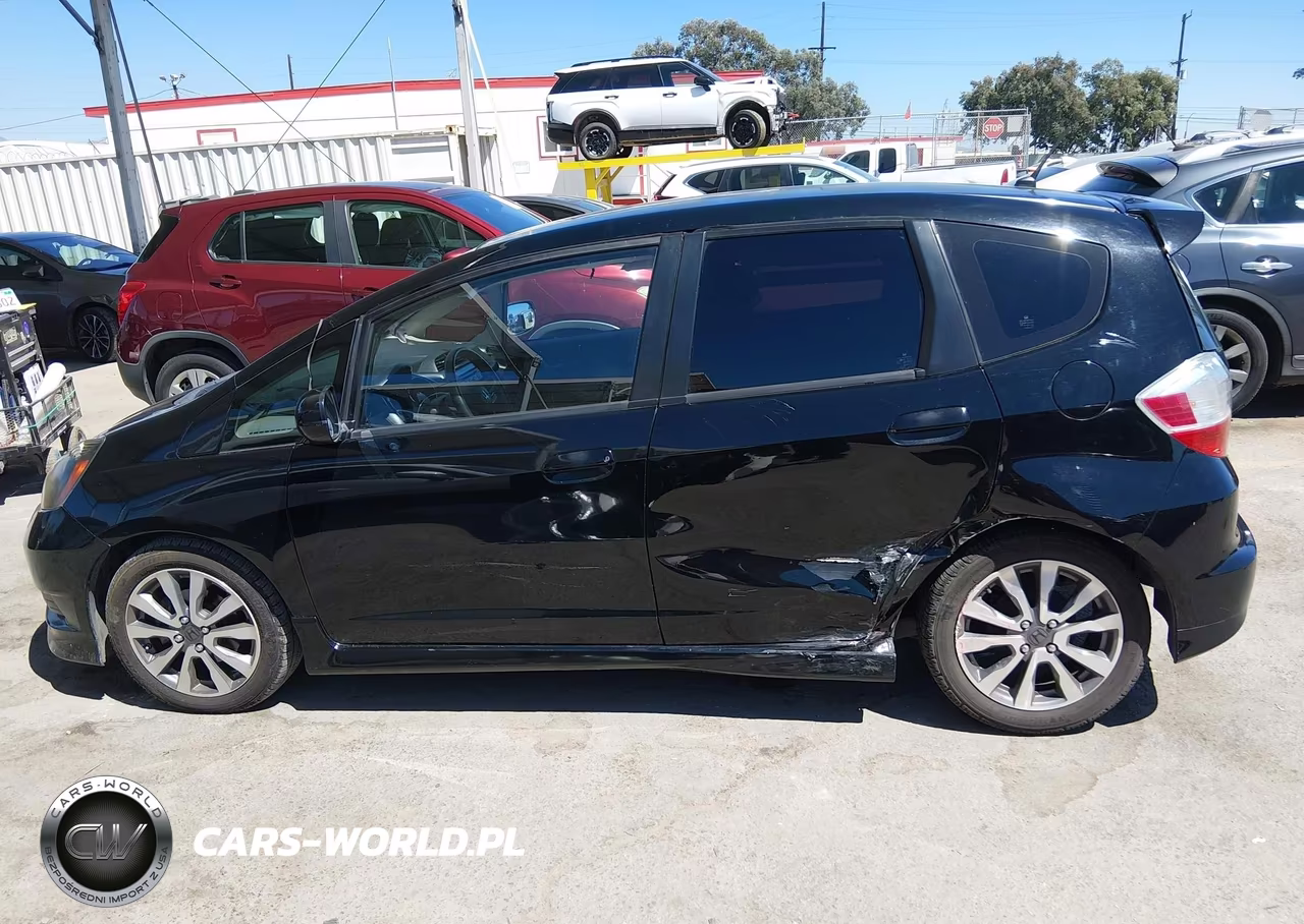 2013 Honda Fit Sport VIN:JHMGE8H56DC050872 - 14