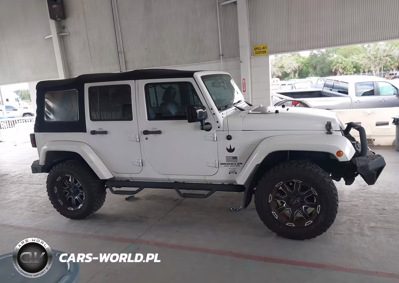 2014 Jeep Wrangler Unlimited Altitude VIN:1C4BJWEG2EL323003 - 13