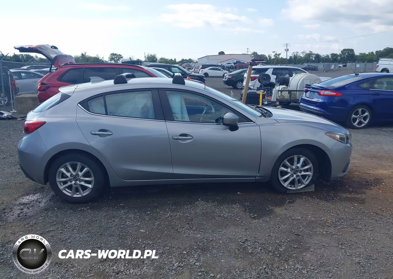 2014 Mazda Mazda3 I Touring VIN:JM1BM1L74E1105024 - 13