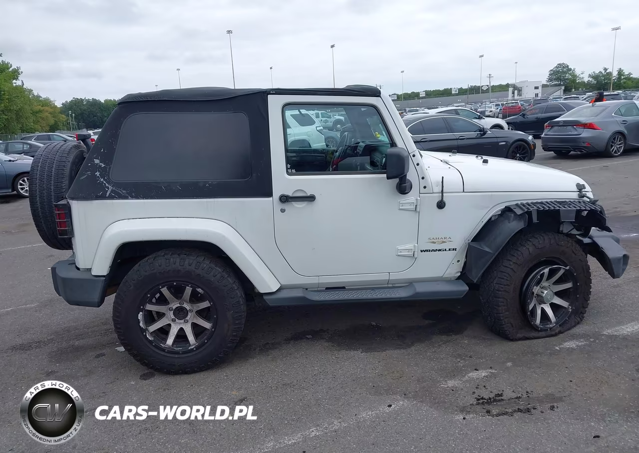 2011 Jeep Wrangler Sahara VIN:1J4AA5D17BL633544 - 14