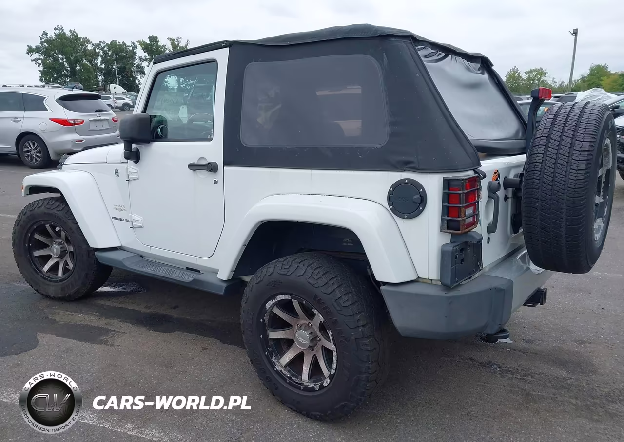 2011 Jeep Wrangler Sahara VIN:1J4AA5D17BL633544 - 3