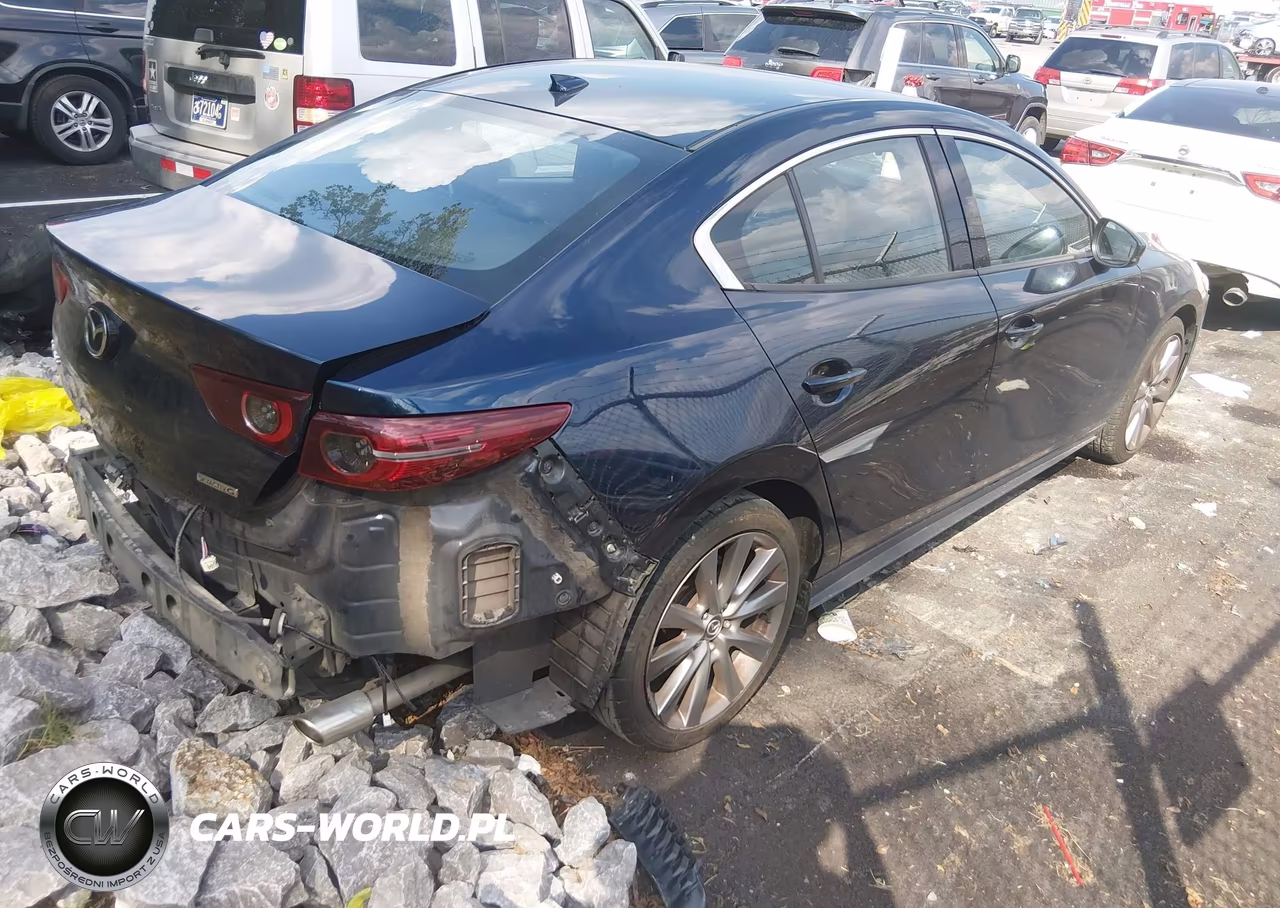 2019 Mazda Mazda3 Premium Package VIN:3MZBPAEMXKM101808 - 4