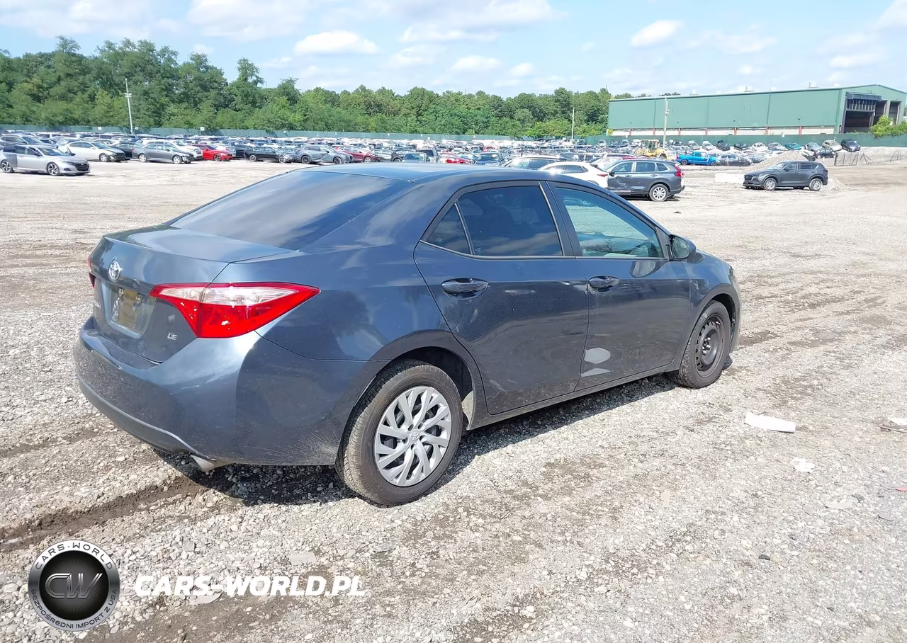 2017 Toyota Corolla Le VIN:5YFBURHE2HP693981 - 4