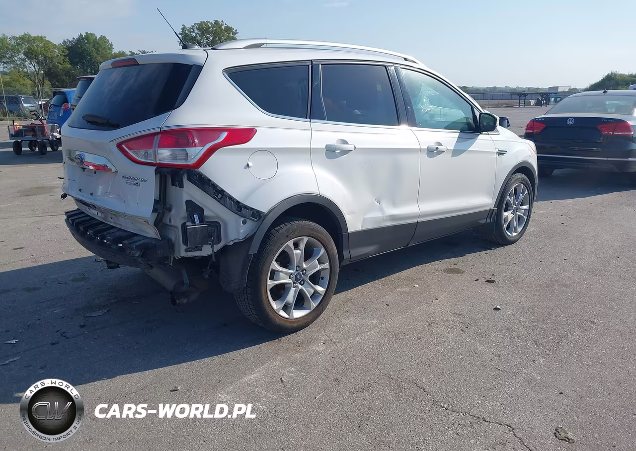 2015 Ford Escape Titanium VIN:1FMCU9J93FUB29902 - 4