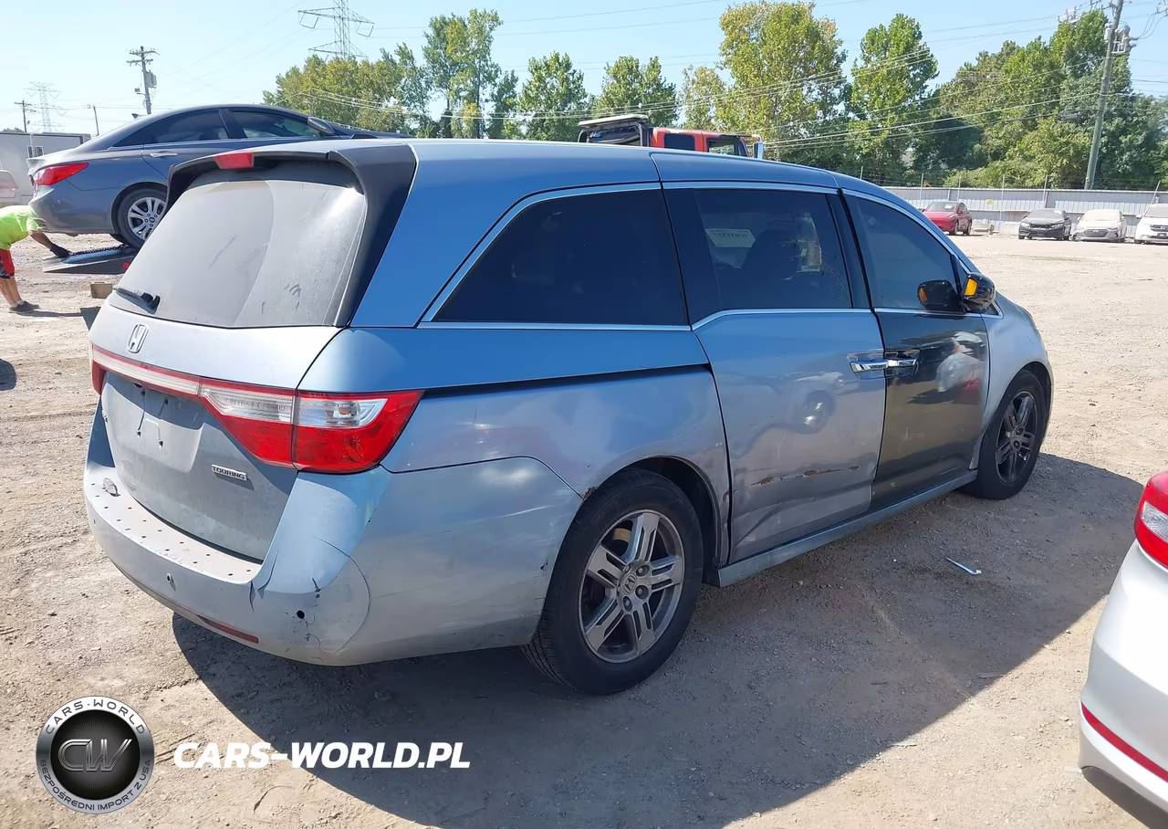 2011 Honda Odyssey Touring-Touring Elite VIN:5FNRL5H92BB073387 - 4