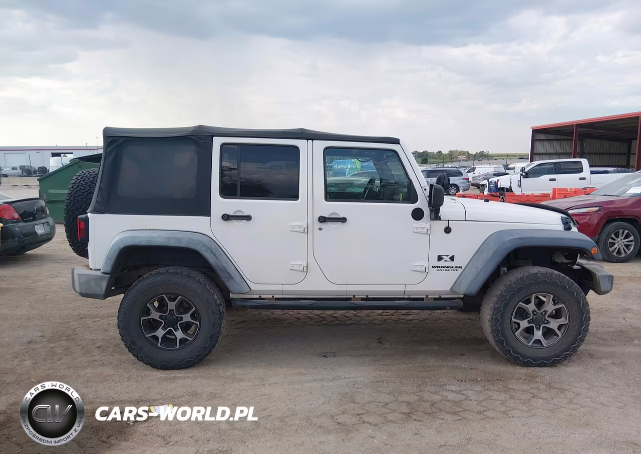 2009 Jeep Wrangler Unlimited X VIN:1J4GA39109L756412 - 13