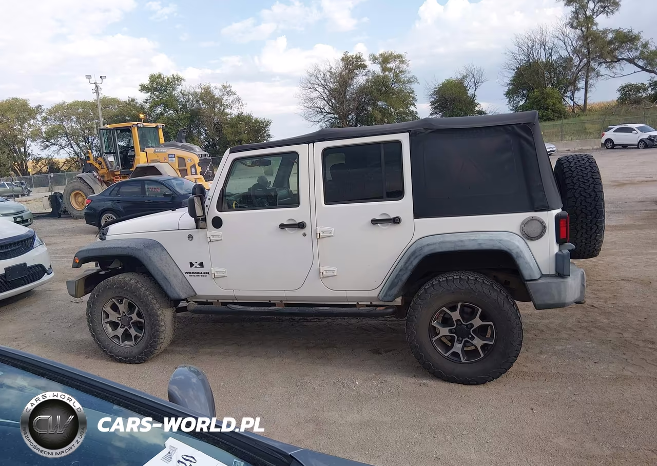2009 Jeep Wrangler Unlimited X VIN:1J4GA39109L756412 - 14