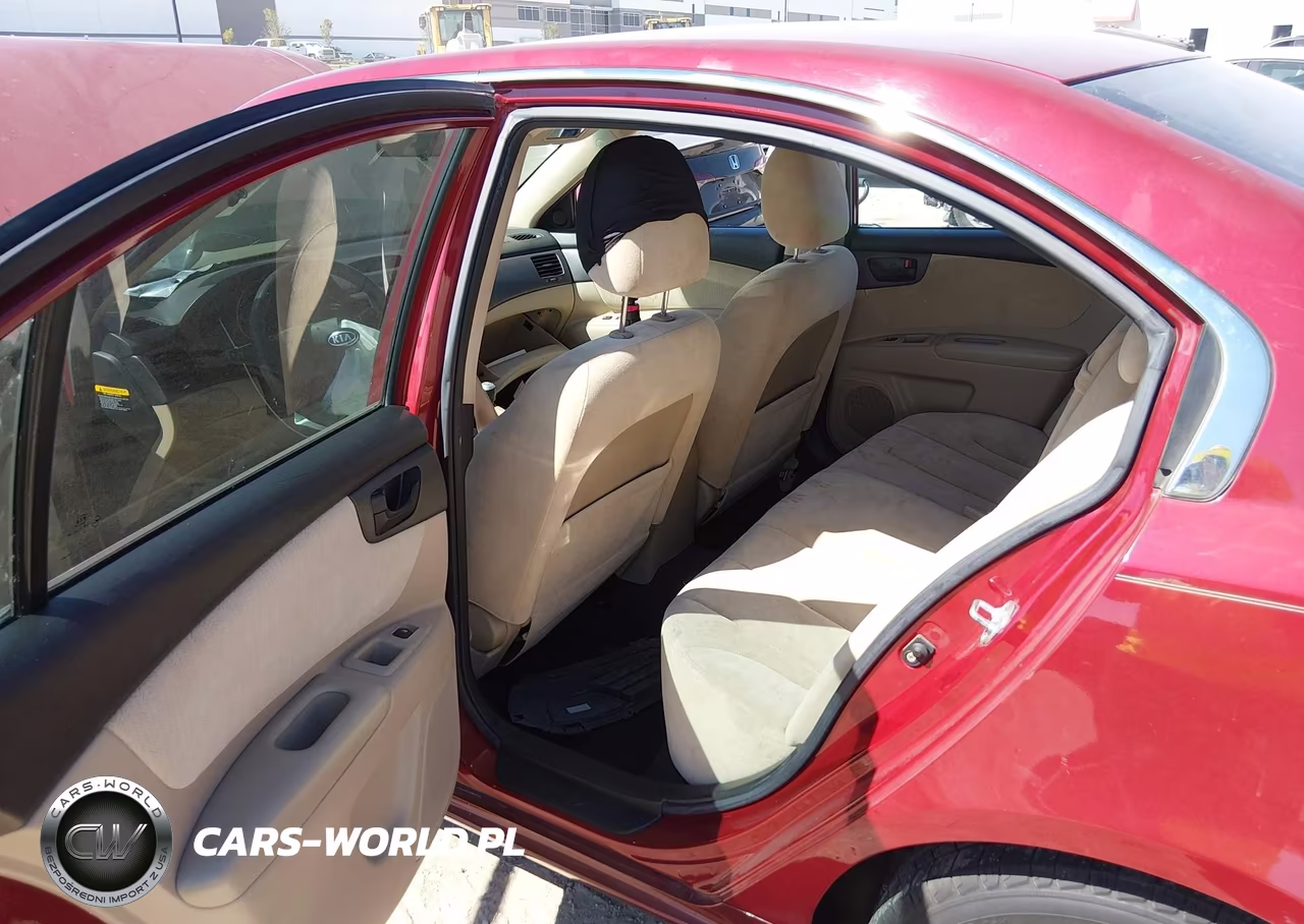 2009 Kia Optima Lx VIN:KNAGE228X95322544 - 8
