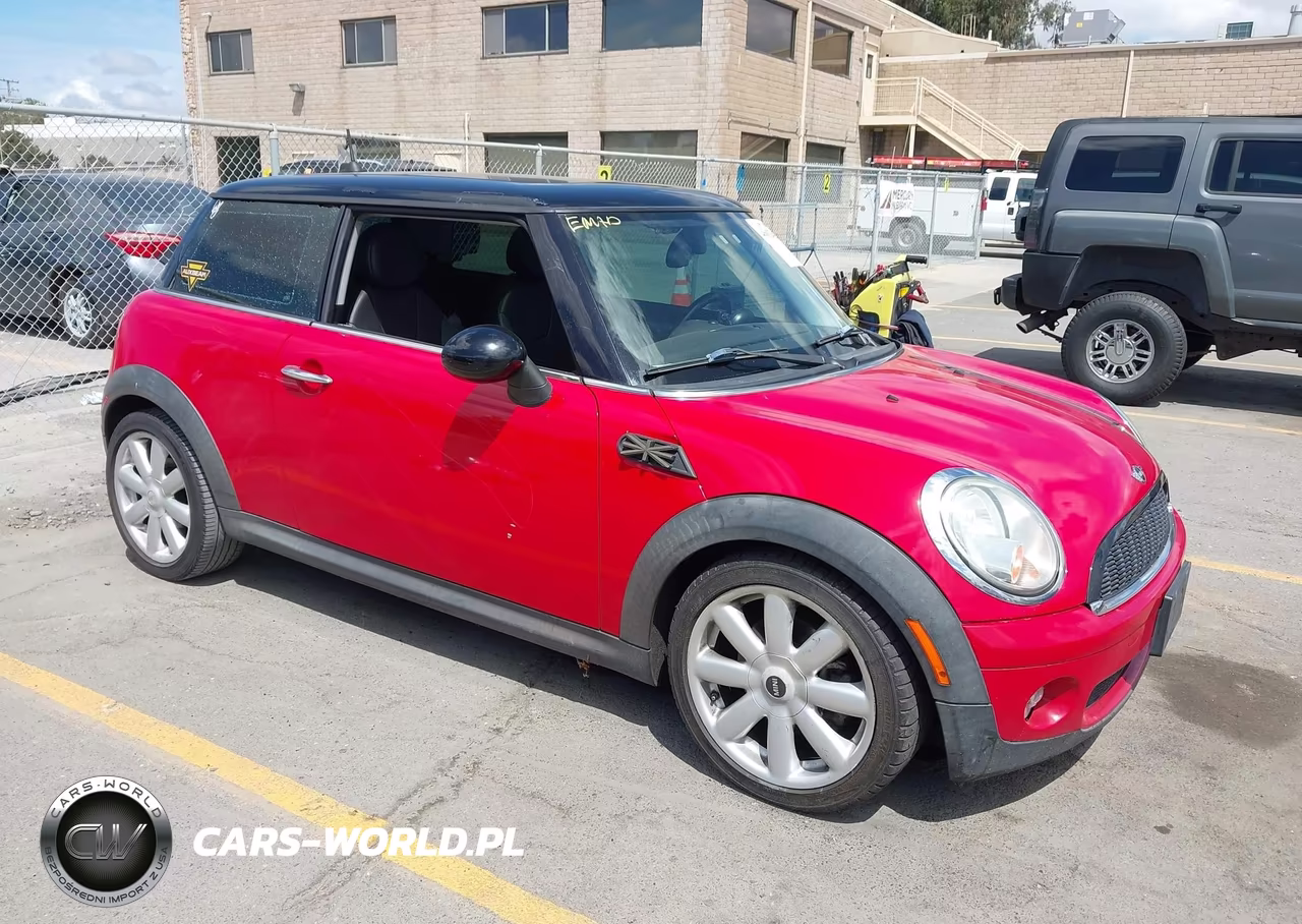 2009 Mini Cooper VIN:WMWMF33549TW73729 - 1