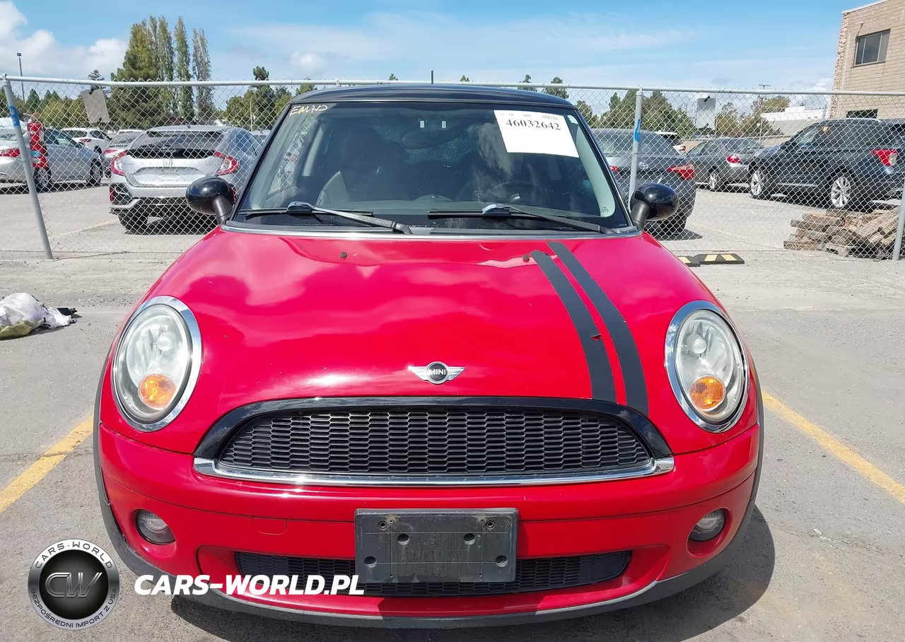 2009 Mini Cooper VIN:WMWMF33549TW73729 - 12