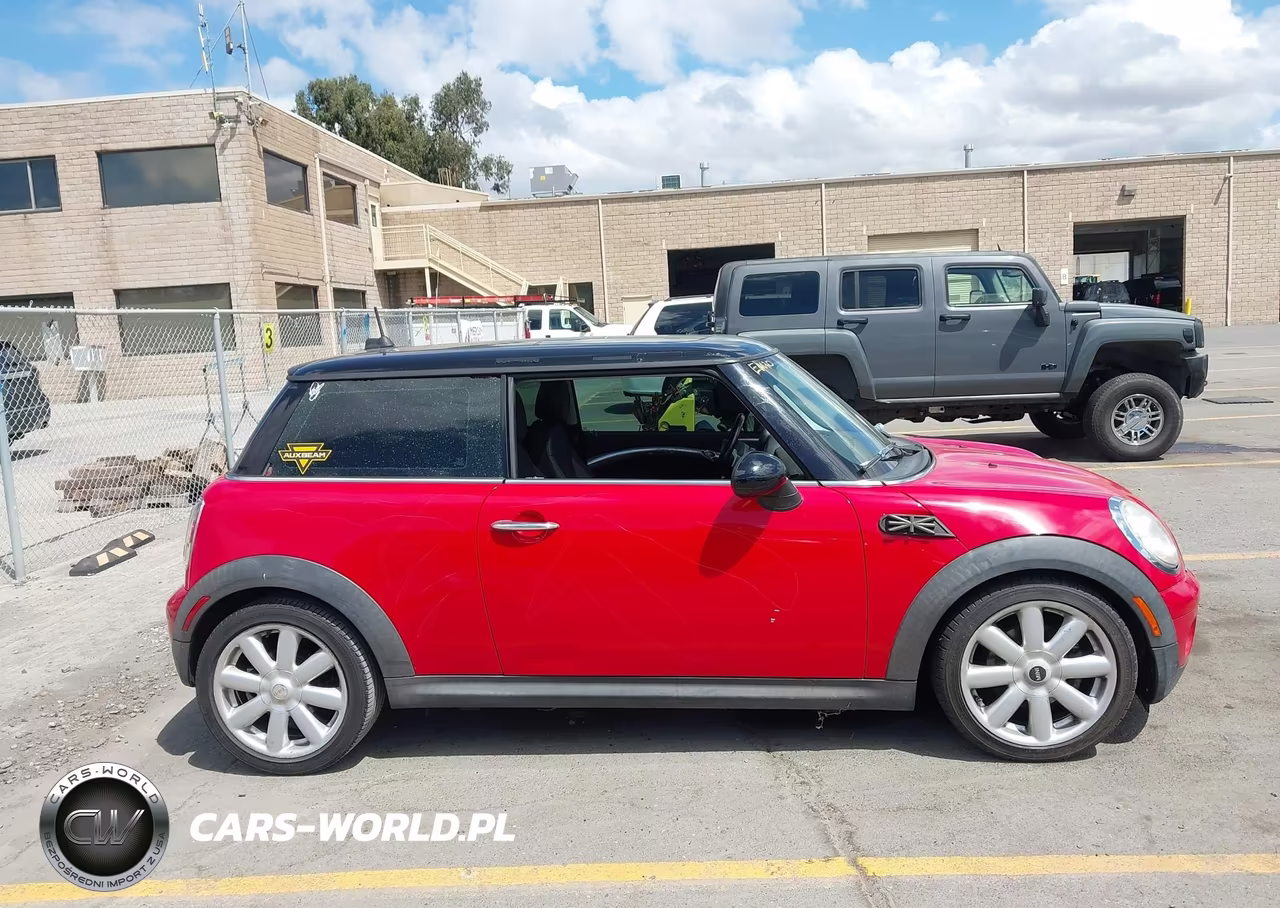 2009 Mini Cooper VIN:WMWMF33549TW73729 - 13