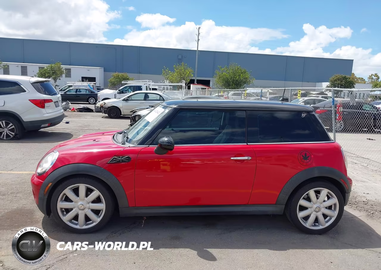 2009 Mini Cooper VIN:WMWMF33549TW73729 - 14
